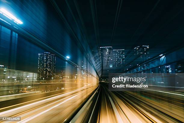 tokyo subway tracks - city lights reflected on buildings speed stock pictures, royalty-free photos & images