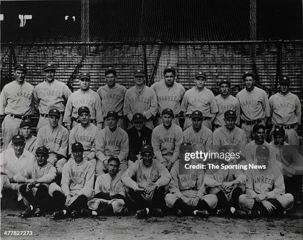 New York Yankees team photo 1st row: L-R - trainer Woods, Mike Gazella, Joe Dugan, Mascot Bennett, Ben Paschal, Myles Thomas, Gene Robertson, Rosy...