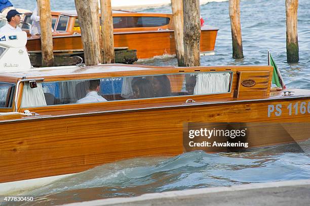 First Lady Michelle Obama and her daughters sit on the back of a Police boat leading to the Doge Palace on June 19, 2015 in Venice, Italy. Michelle...