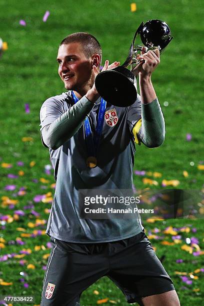 Predrag Rajkovic of Serbia celebrates with the trophy after winning the FIFA U-20 World Cup Final match between Brazil and Serbia at North Harbour...