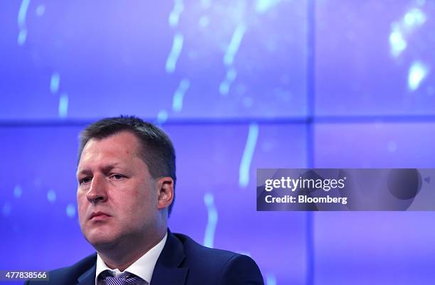 Oleg Kostin, vice president of Gazprombank, pauses during a session at the St. Petersburg International Economic Forum in Saint Petersburg, Russia,...
