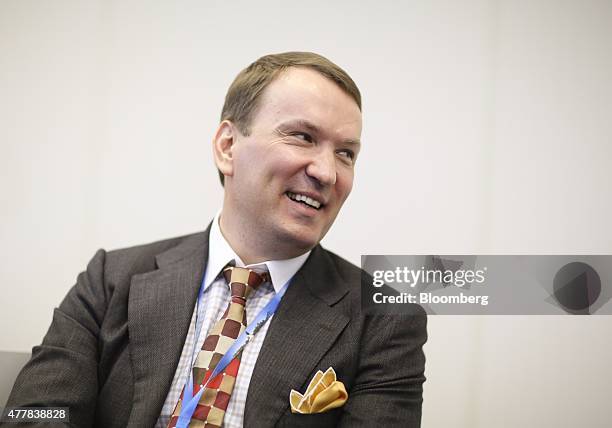 Dmitry Kostygin, chairman of the board of directors of Ulmart, reacts during a session at the St. Petersburg International Economic Forum in Saint...