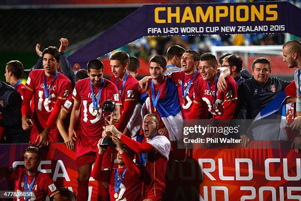 Serbia celebrate with the FIFA U20 trophy following the FIFA U-20 World Cup Final match between Brazil and Serbia at North Harbour Stadium on June...