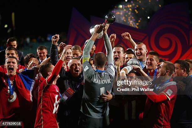 Predrag Rajkovic of Serbia holds up the trophy following the FIFA U-20 World Cup Final match between Brazil and Serbia at North Harbour Stadium on...