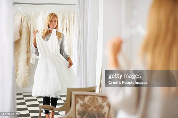 searching for that special dress - white wedding dress stock pictures, royalty-free photos & images