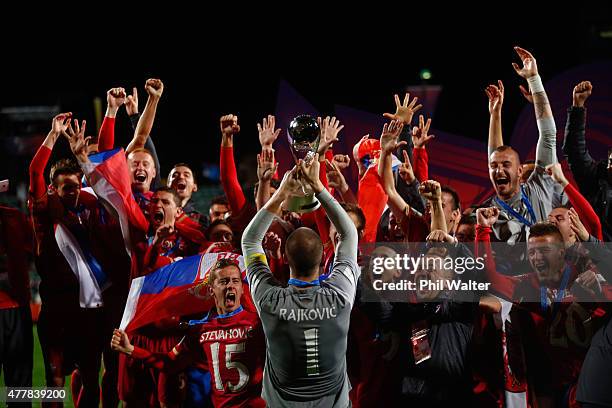 Predrag Rajkovic of Serbia holds up the trophy following the FIFA U-20 World Cup Final match between Brazil and Serbia at North Harbour Stadium on...