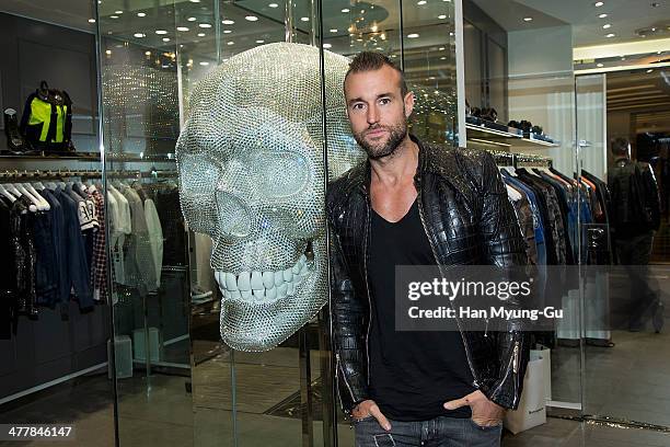 Designer Philipp Plein poses for media before the Philipp Plein S/S 2014 Collection at Lotte Department Store on March 11, 2014 in Seoul, South Korea.