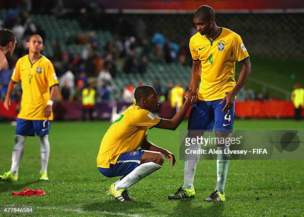 Alef and Marlon of Brazil look dejected after the FIFA U-20 World Cup Final match between Brazil and Serbia at North Harbour Stadium on June 20, 2015...