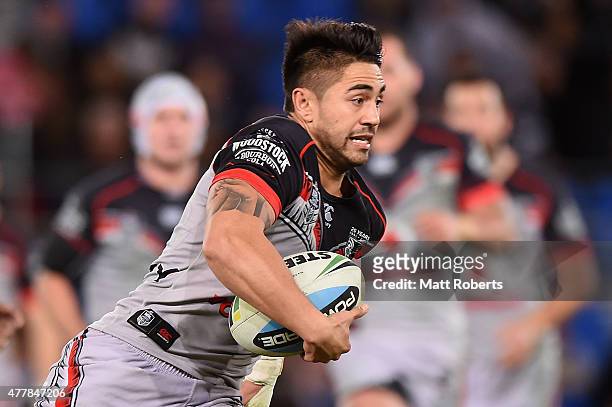 Shaun Johnson of the Warriors runs with the ball during the round 15 NRL match between the Gold Coast Titans and the New Zealand Warriors at Cbus...
