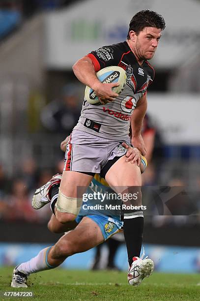 Chad Townsend of the Warriors makes a break during the round 15 NRL match between the Gold Coast Titans and the New Zealand Warriors at Cbus Super...