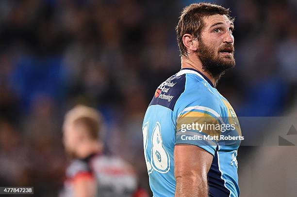 Dave Taylor of the Titans looks on during the round 15 NRL match between the Gold Coast Titans and the New Zealand Warriors at Cbus Super Stadium on...