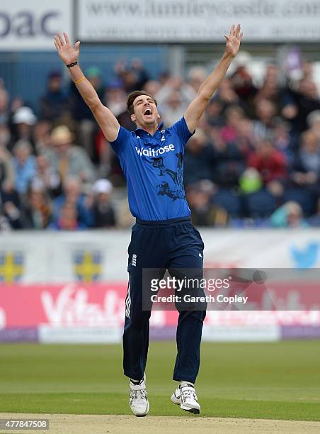 Steven Finn of England celebrates bowling Brendon McCullum of New Zealand during the 5th ODI Royal London One-Day match between England and New...