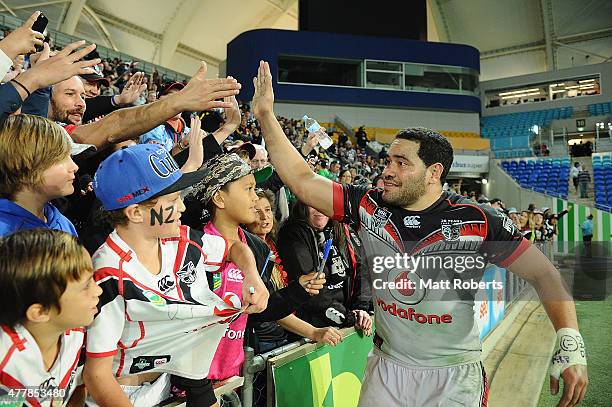 Konrad Hurrell of the Warriors celebrates with fans after the round 15 NRL match between the Gold Coast Titans and the New Zealand Warriors at Cbus...