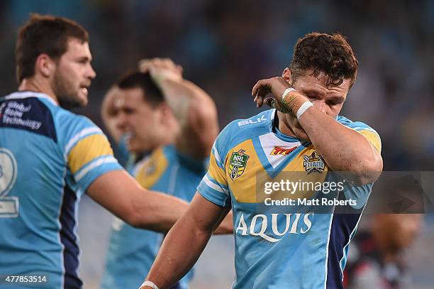 James Roberts of the Titans wipes his faces during the round 15 NRL match between the Gold Coast Titans and the New Zealand Warriors at Cbus Super...