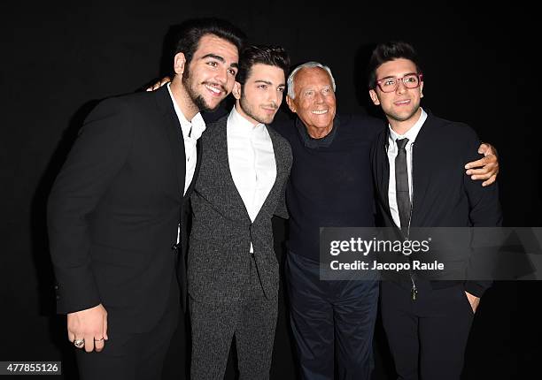 Ignazio Boschetto, Gianluca Ginoble, Fashion Designer Giorgio Armani and Piero Barone attend the Emporio Armani fashion show during the Milan Men's...