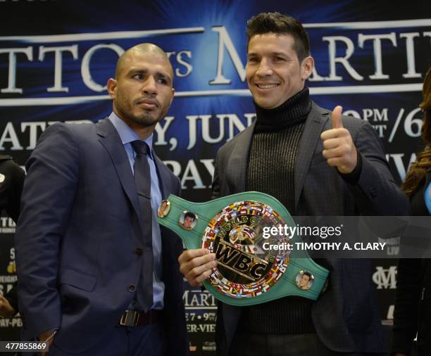 Three-division world champion Miguel Cotto of Puerto Rico and World Boxing Council /The Ring middleweight champion, Argentina's Sergio "Maravilla"...