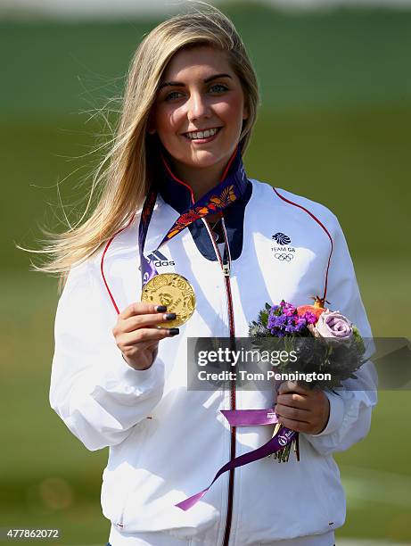 Gold medalist Amber Hill of Great Britain celebrates with the medal won in during the Women's Skeet shooting final during day eight of the Baku 2015...