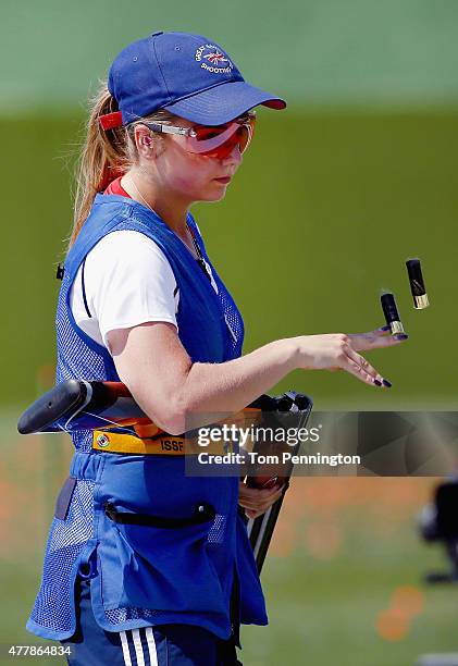 Amber Hill of Great Britain competes during the Women's Skeet shooting fina during day eight of the Baku 2015 European Games at the Baku Shooting...