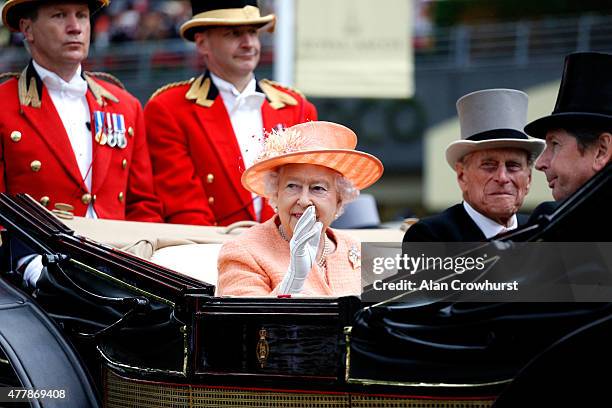 Queen Elizabeth II, Prince Phillip, Duke of Edinburgh and John Warren during the Royal Procession on day 5 of Royal Ascot 2015 at Ascot racecourse on...