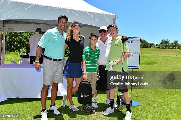 Nina Agdal and Guest attends JEEP 11th Annual Celebrity Golf Tournament during The 11th Annual Irie Weekend at Miami Beach Golf Club on June 19, 2015...