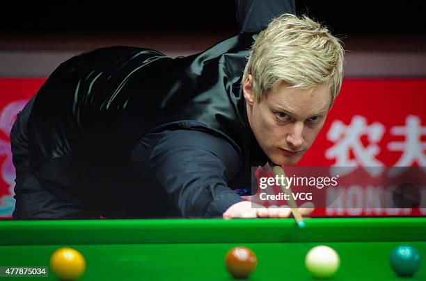 Neil Robertson of Australia plays a shot in quarter-finals match with Vinnie Calabrese of Australia against Zhou Yuelong and Yan Bingtao of China B...