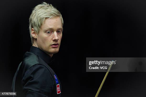 Neil Robertson of Australia reacts in quarter-finals match with Vinnie Calabrese of Australia against Zhou Yuelong and Yan Bingtao of China B on day...