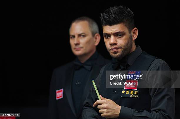 Vinnie Calabrese of Australia reacts in quarter-finals match with Neil Robertson of Australia against Zhou Yuelong and Yan Bingtao of China B on day...