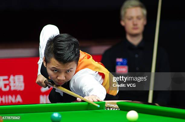 Zhou Yuelong of China B plays a shot in quarter-finals match with Yan Bingtao of China B against Neil Robertson and Vinnie Calabrese of Australia on...