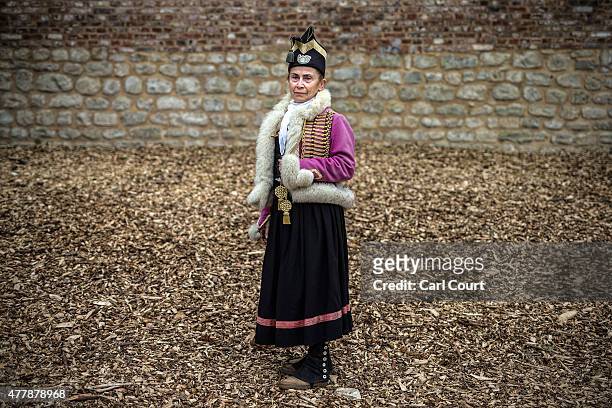 Historical re-enactor from France playing a role in the French Napoleonic army poses for a photograph ahead of the second part of a large scale...