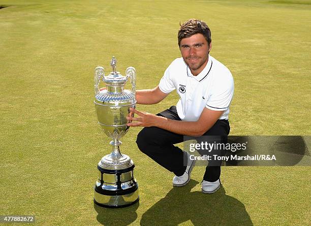 Romain Langasque of France poses with The Amateur Championship Trophy after winning the Final of The Amateur Championship 2015 - Day Six at...