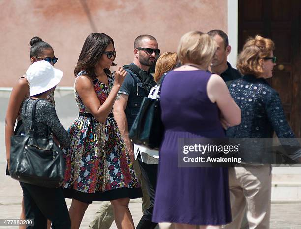 First Lady Michelle Obama arrives on the island of Murano for a tour of a glass factory on June 20, 2015 in Venice, Italy. Michelle Obama has...