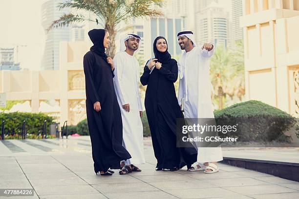 group of young modern arabs in dubai, united arab emirates - the united arab emirates stock pictures, royalty-free photos & images