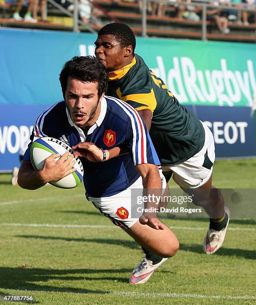 Arthur Bonneval of France evades Warrick Gelant to score the first try during the World Rugby U20 Championship 3rd Place Play-Off match between...