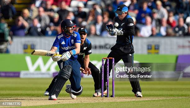 England batsman Joe Root looks on as wicketkeeper Luke Ronchi prepares to stump him during the 5th Royal London One day international between England...