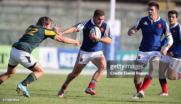 Eliott Roudil of France breaks clear of Daniel du Plessis during the World Rugby U20 Championship 3rd Place Play-Off match between France and South...