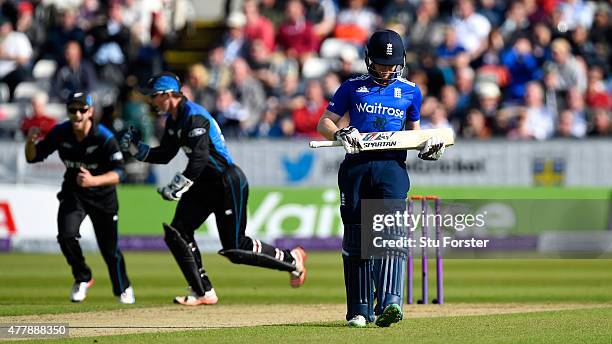 England batsman Eoin Morgan leaves the field after being dismissed first ball as wicketkeeper Luke Ronchi celebrates during the 5th Royal London One...