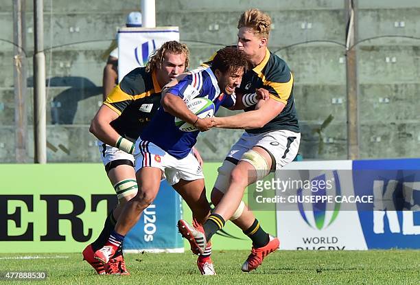 France's Alexandre Pilati fight for the ball with South Africa Dan Du Preez and RG Snyman during the World Rugby Union U20 Championship 3rd place...