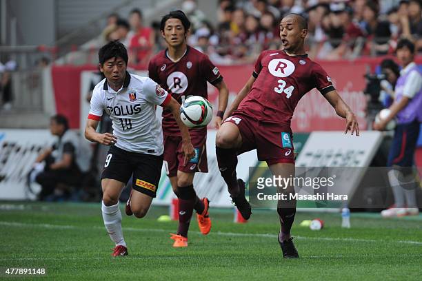 Bueno of Vissel Kobe in action during the J.League match between Vissel Kobe and Urawa Red Diamonds at Noevir Stadium Kobe on June 20, 2015 in Kobe,...
