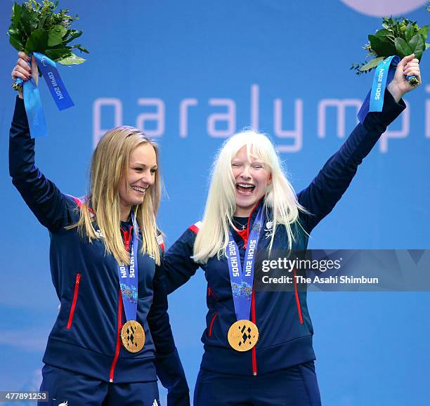 Kelly Gallagher of Great Britain and guide Charlotte Evans clebrate winning gold in the Women's Super-G - Visually Impaired during day three of Sochi...