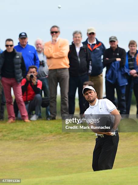 Romain Langasque of France watches his chip shot the 9th green during day Six of the Amateur Championship 2015 at Carnoustie Golf Links on June 20,...