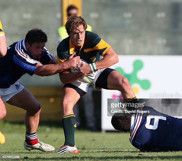 Ivan van Zyl of South Africa is held during the World Rugby U20 Championship 3rd Place Play-Off match between France and South Africa at Stadio...