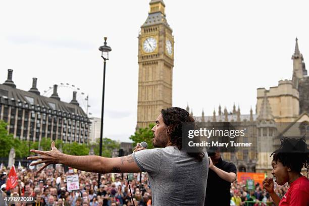 Comedian Russell Brand speaks to thousands of demonstrators gathered in Parliament Square to protest against austerity and spending cuts on June 20,...