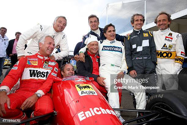 Christian Danner, Riccardo Patrese, Gerhard Berger, Niki Lauda, Jean Alesi, Nelson Piquet, Pierluigi Martini and Alain Prost pose on track after...