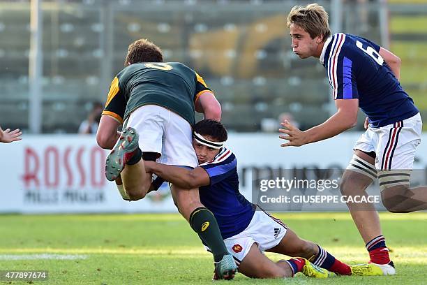 France's Gauthier Doubrere fights for the ball with South Africa Jacques Vermeulen during the World Rugby Union U20 Championship, 3rd place Play-off...