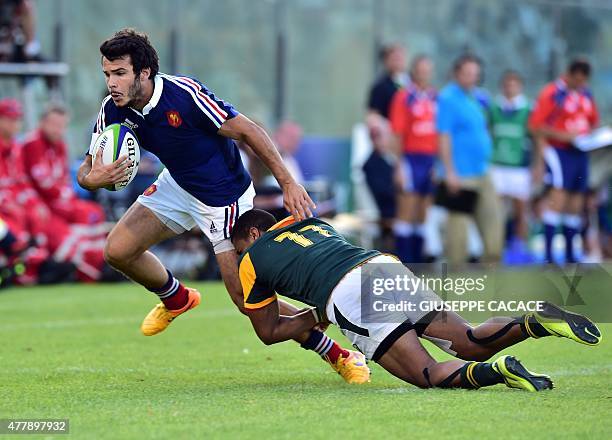 France's Arthur Conneval fights for the ball with South Africa Leonis Zas during the World Rugby Union U20 Championship 3rd place Play-off match...