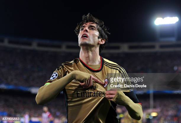 Kaka of AC Milan celebrates with after scoring his team's first goal during the UEFA Champions League Round of 16, second leg match between Club...