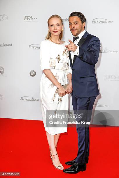 Kostja Ullmann and Janin Reinhardt attend the German Film Award 2015 Lola at Messe Berlin on June 19, 2015 in Berlin, Germany.