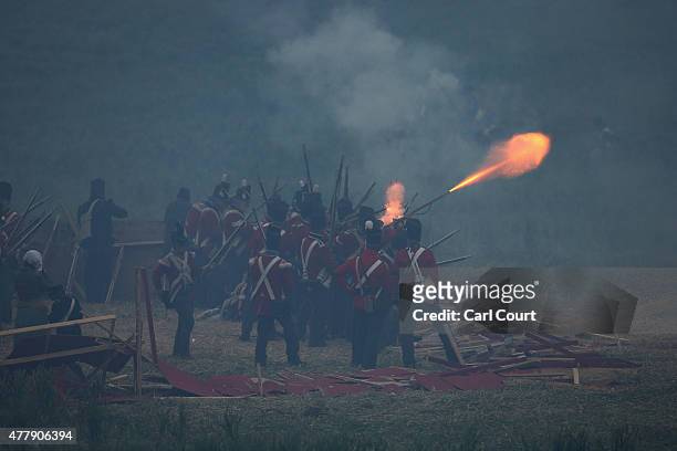 Historical re-enactors take part in the second part of a large scale re-enactment of the battle of Waterloo, to mark it's bicentenary on June 20,...