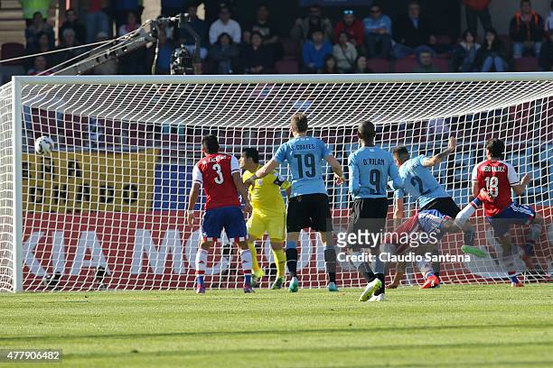 Jose Maria Gimenez of Uruguay heads to score the opening goal during the 2015 Copa America Chile Group B match between Uruguay and Paraguay at La...