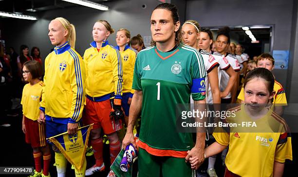 Nadine Angerer of Germany is seen with her team mates in the tunnel during the FIFA Women's World Cup 2015 Round of 16 match between Germany and...